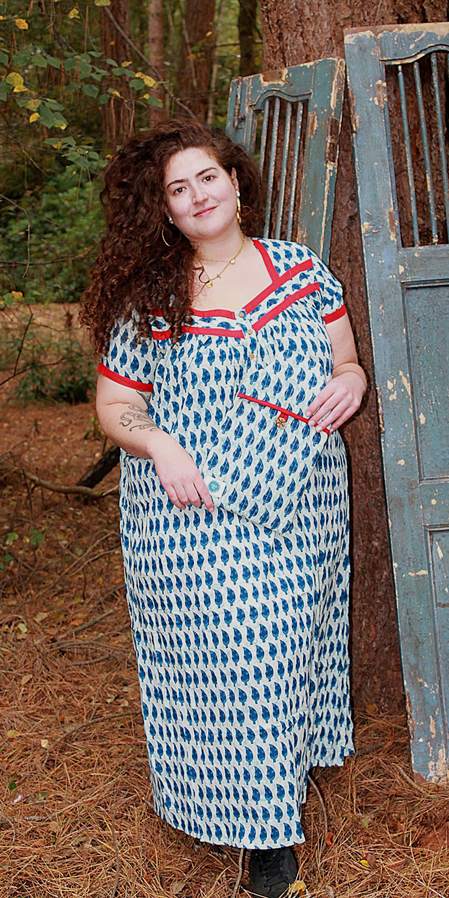 Plus size model wearing blue indigo nightie with sleeves full image