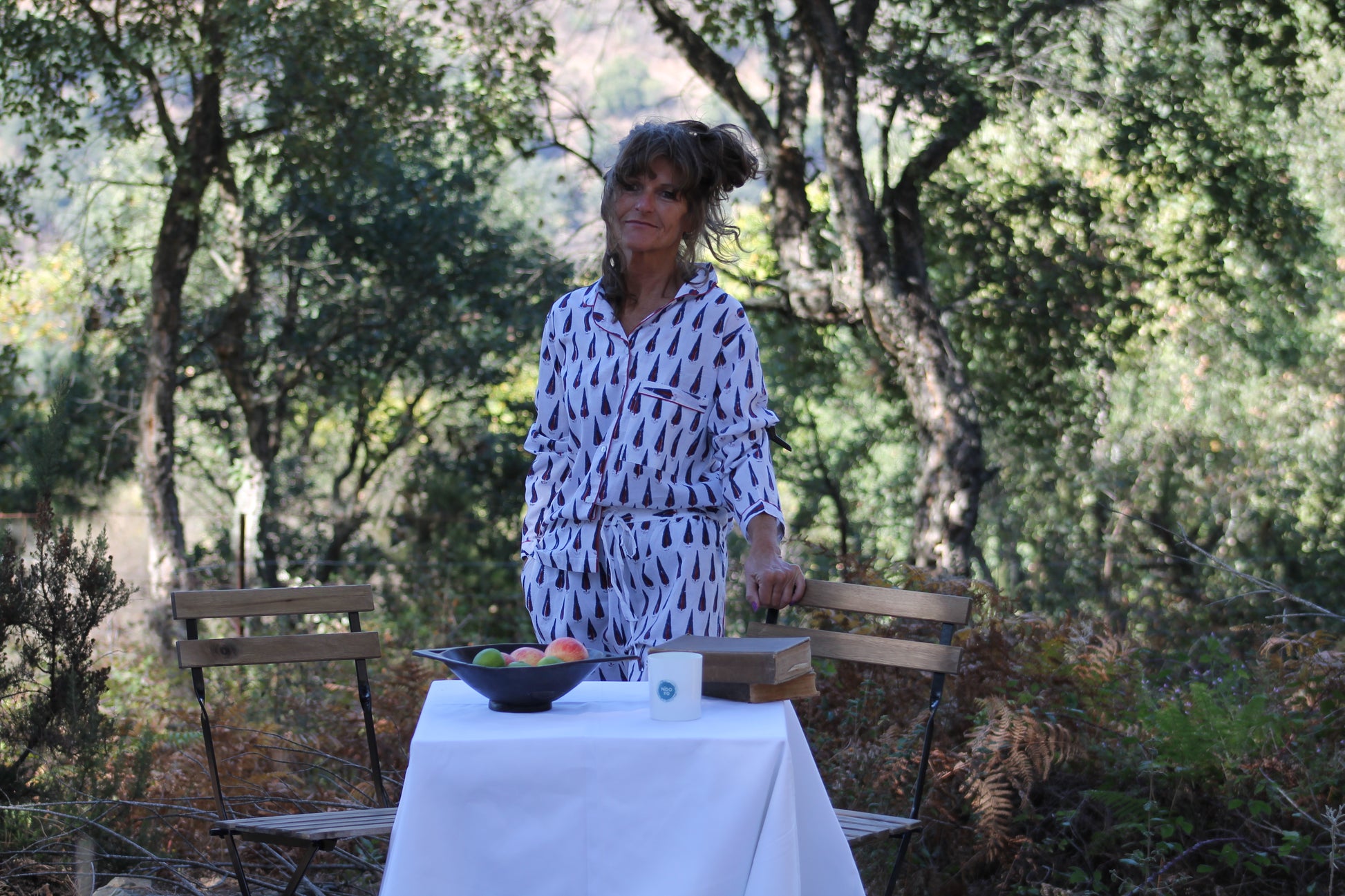 model showcasing white navy and red trees pyjama set close up