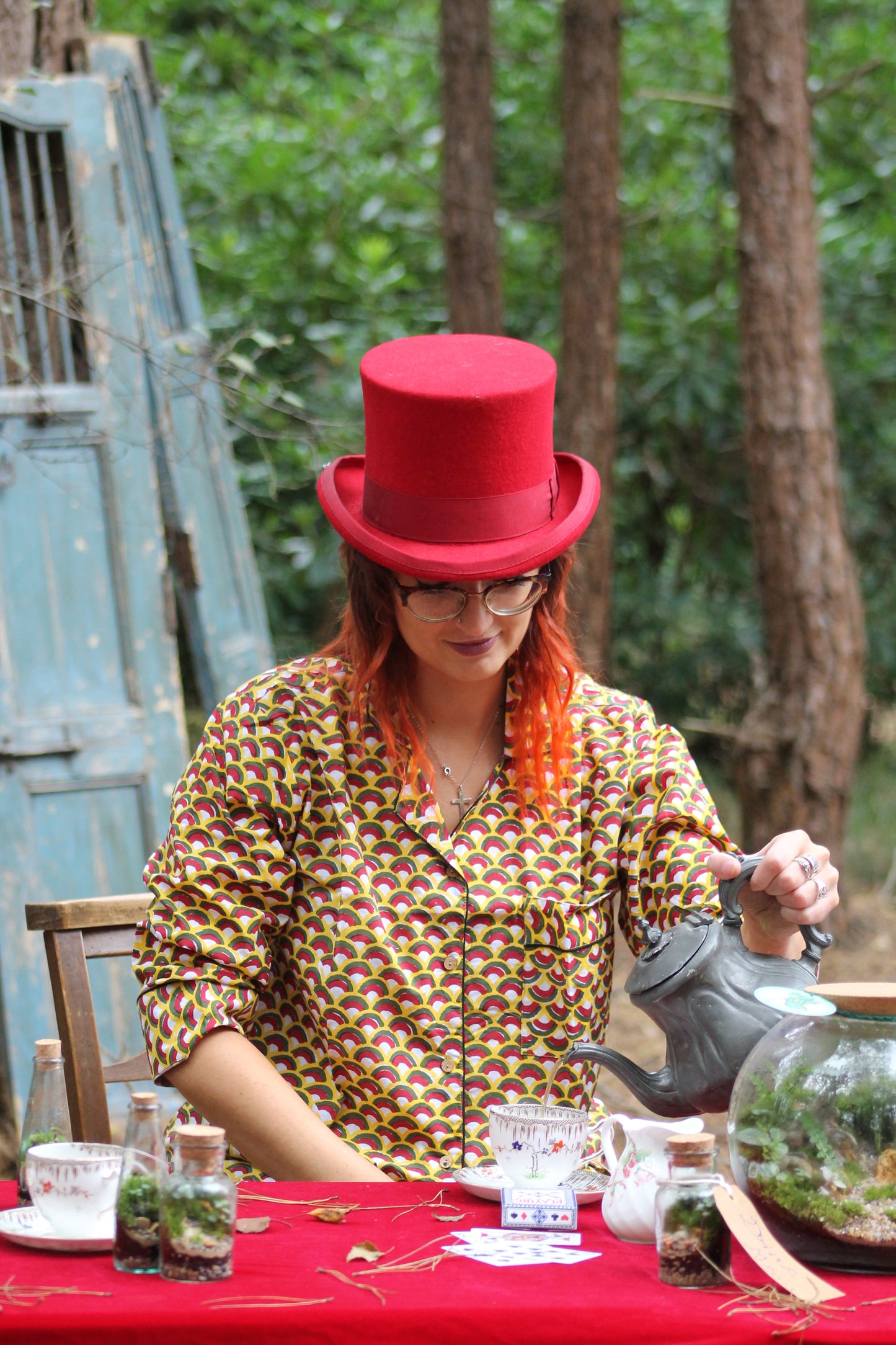 model wearing geometric pyjamas close up of top half, red yellow and black hand block printed top