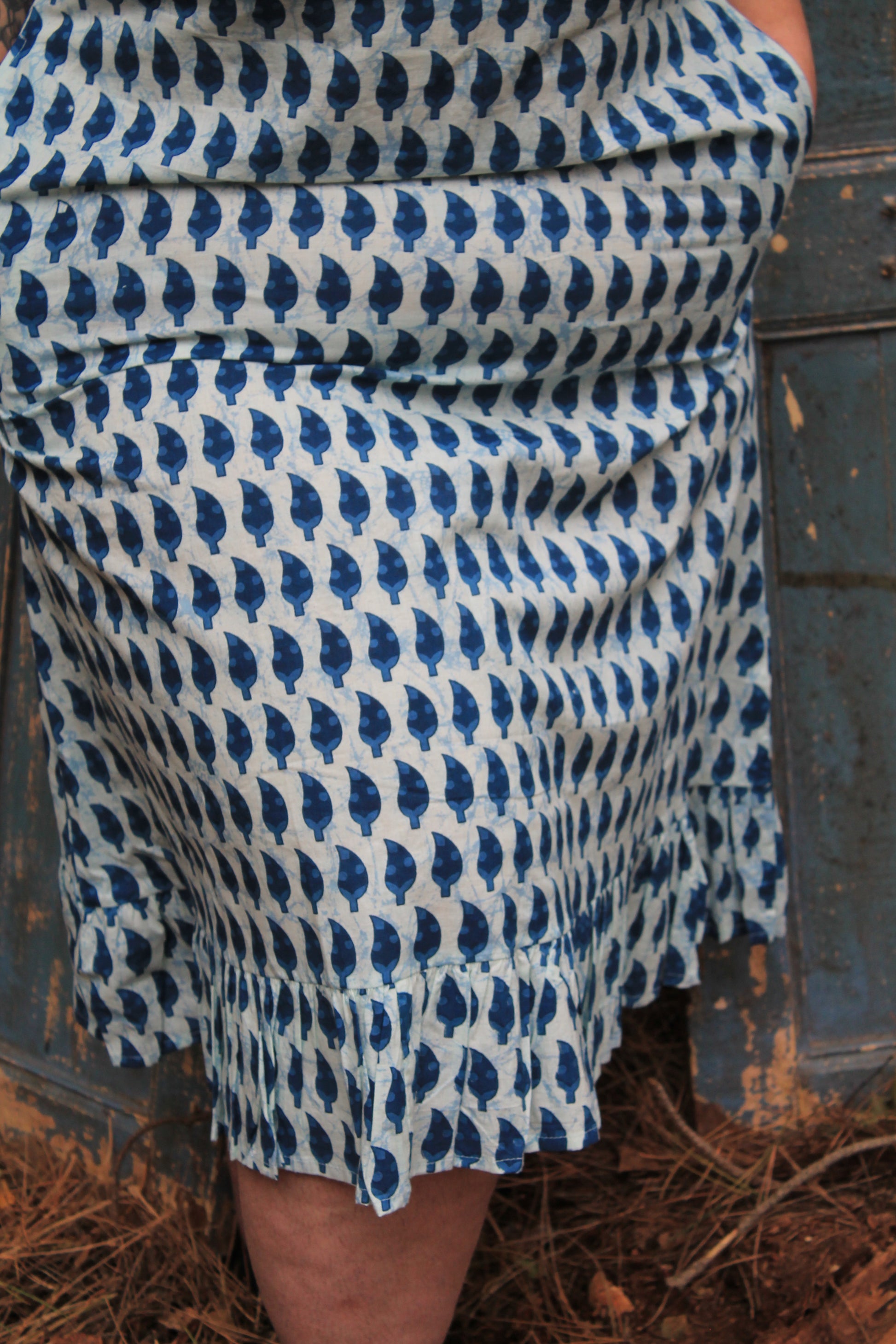 Plus size model  blude indigo nightdress close up of hem detail and fabric and length