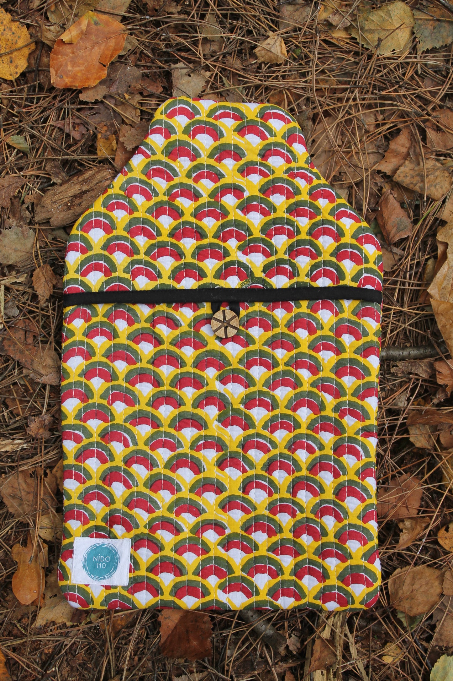 geometric hand block printed water bottle with 2l bottle inside. Black, yello and red colours