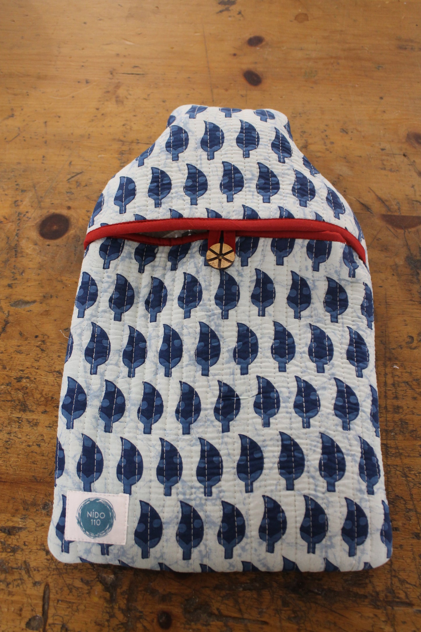 Indigo blue leaf hand block printed quilted hot water bottle cover and 2l bottle inside