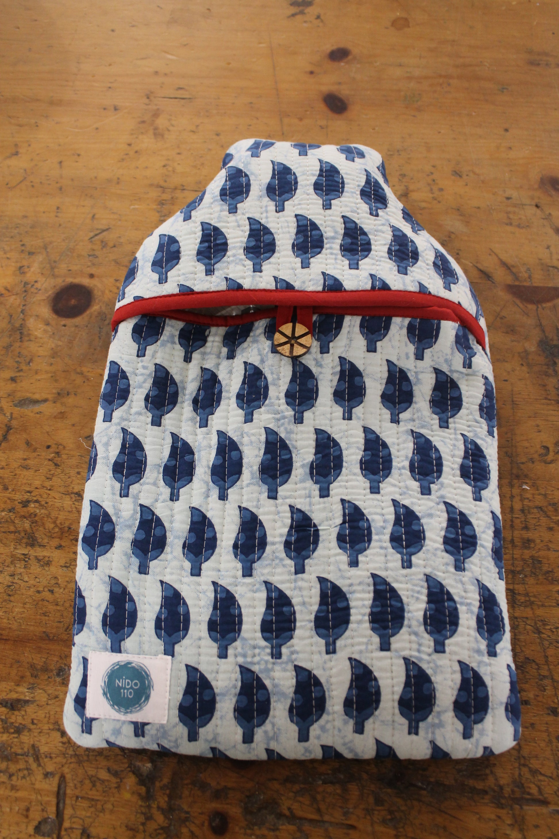 Indigo blue leaf hand block printed quilted hot water bottle cover and 2l bottle inside