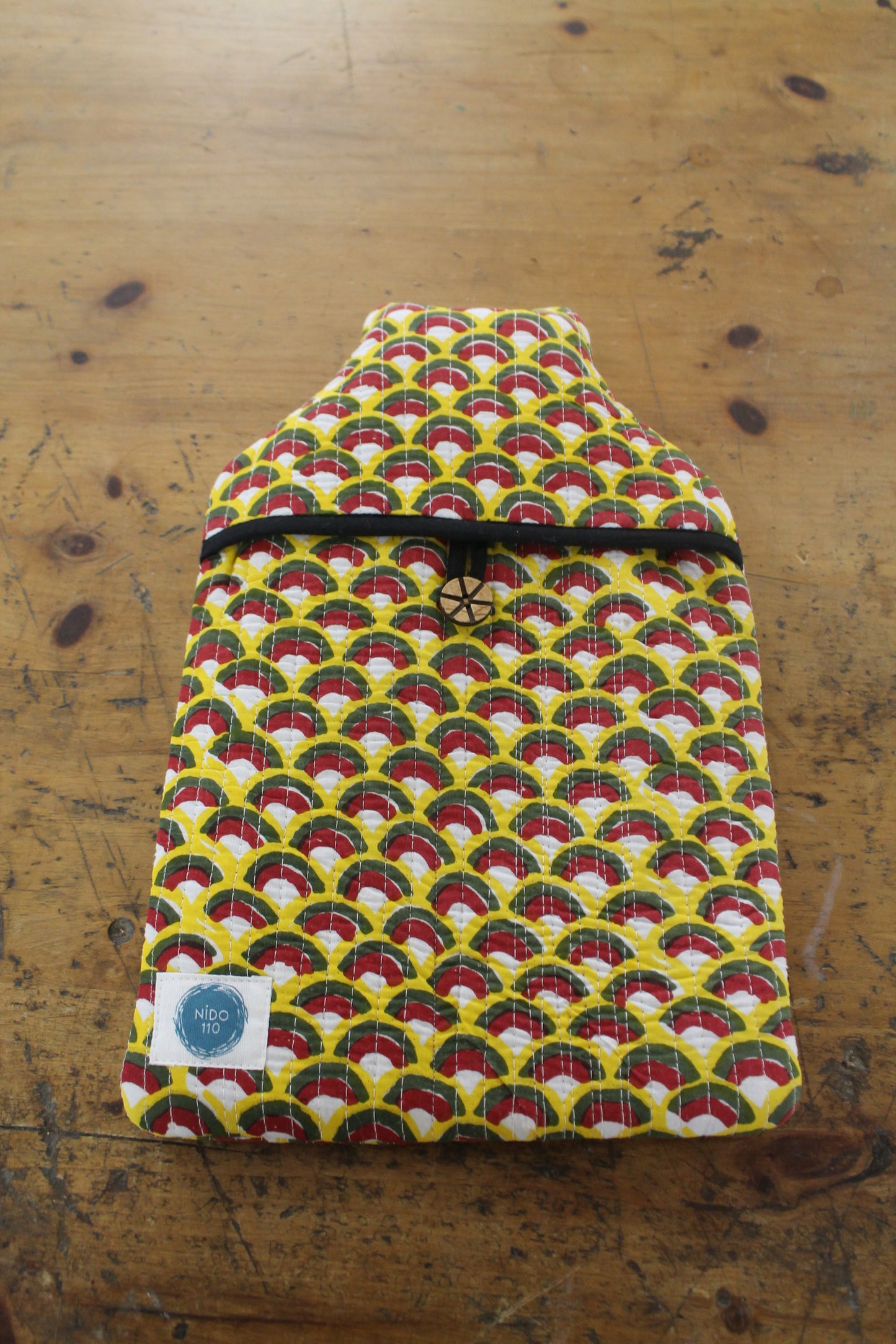 Hot water bottle and cover rainbow yellow, green and red, to match your sleepwear